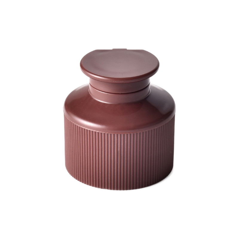 24/410 PP flip top cap for hair care and personal care packaging, front view closed